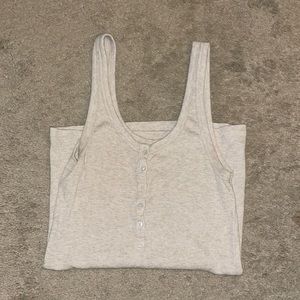 Henley tank top. “Real soft”